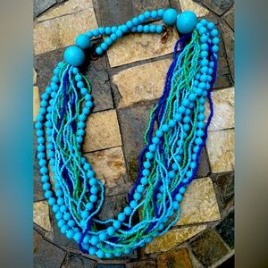 Multistrand beaded necklace in ocean blues